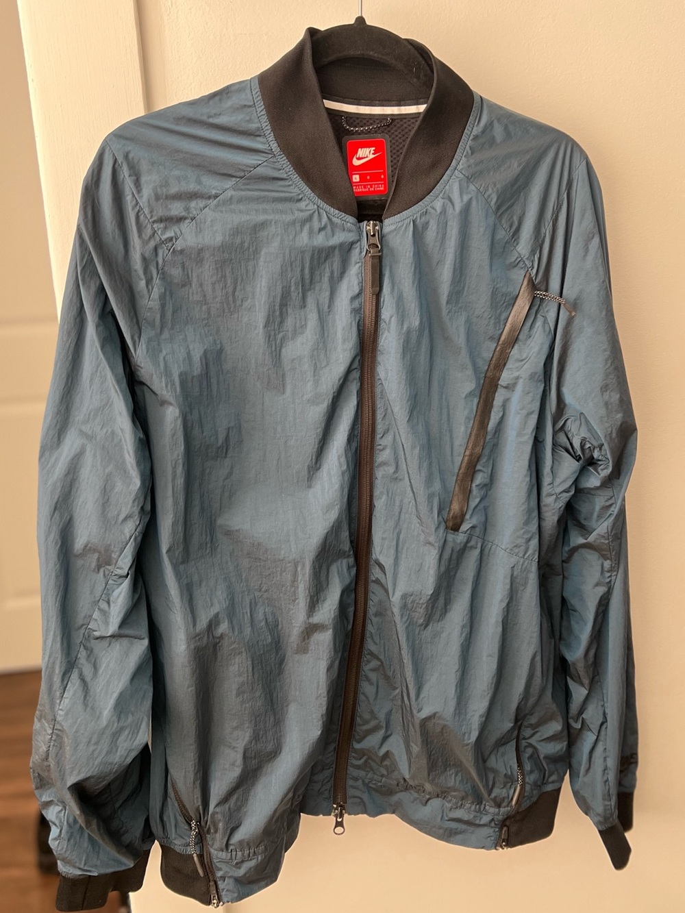 Nike Men's Blue Bomber Jacket with Black Trim